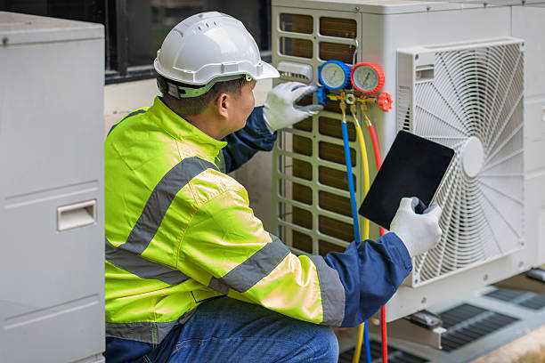 Professional Hvac technician working in Rapid City, MI